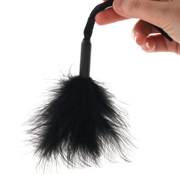 SS-102067_3 S&M Peaches 'n CreaMe Wrist Feather Ticker in Black